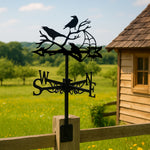 Ravens on branches with spider metal weather vane with directional arrows and mounting rod, outdoor roof and garden decoration