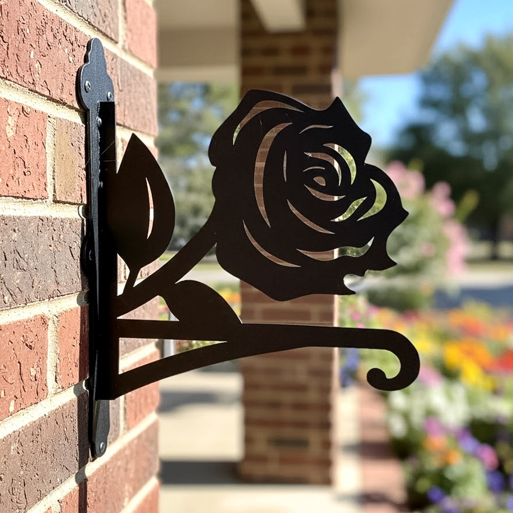 Rose metal hanging basket bracket mounted on outdoor wall for plant decoration