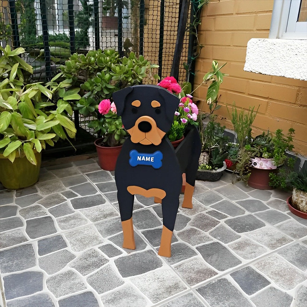 Rottweiler dog planter filled with fresh flowers is placed in the garden