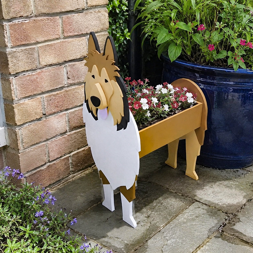 Rough Collie dog planter filled with fresh flowers is placed in the garden