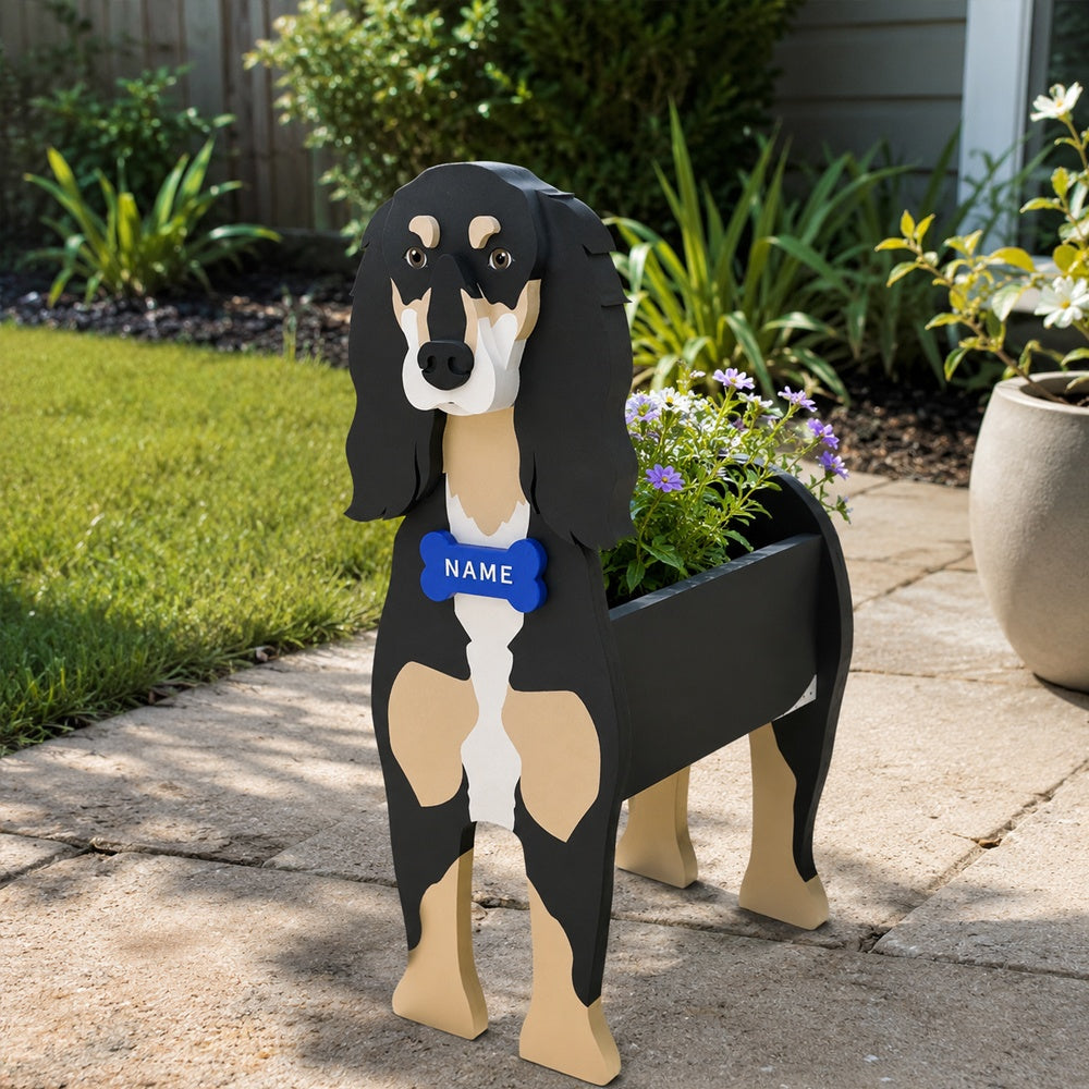 Saluki dog planter filled with fresh flowers is placed in the garden