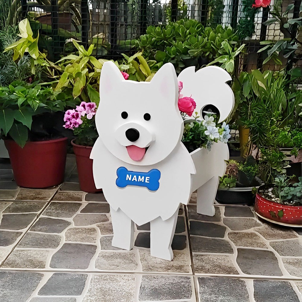 Samoyed dog planter filled with fresh flowers is placed in the garden