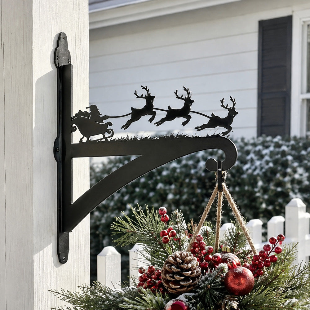 Santa sleigh and reindeer metal hanging basket bracket mounted on outdoor wall for plant decoration