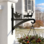Santa sleigh and reindeer metal hanging basket bracket mounted on outdoor wall for plant decoration