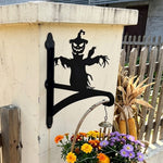 Scarecrow pumpkin metal hanging basket bracket mounted on outdoor wall for plant decoration