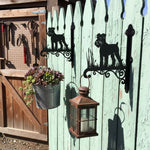 Schnauzer metal hanging basket bracket mounted on outdoor wall for plant decoration