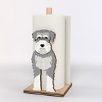 Schnauzer Wooden Dog Paper Towel Holder displayed on a kitchen countertop with a freestanding paper towel roll