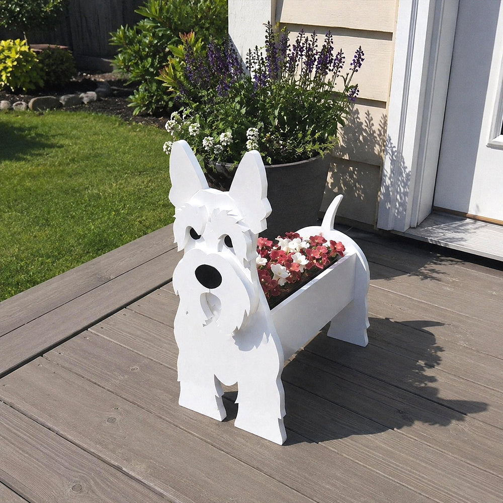 Scottish Terrier dog planter filled with fresh flowers is placed in the garden