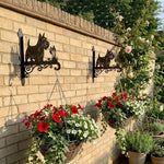 Scottish terrier metal hanging basket bracket mounted on outdoor wall for plant decoration
