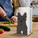 Scottish Terrier Wooden Dog Paper Towel Holder displayed on a kitchen countertop with a freestanding paper towel roll