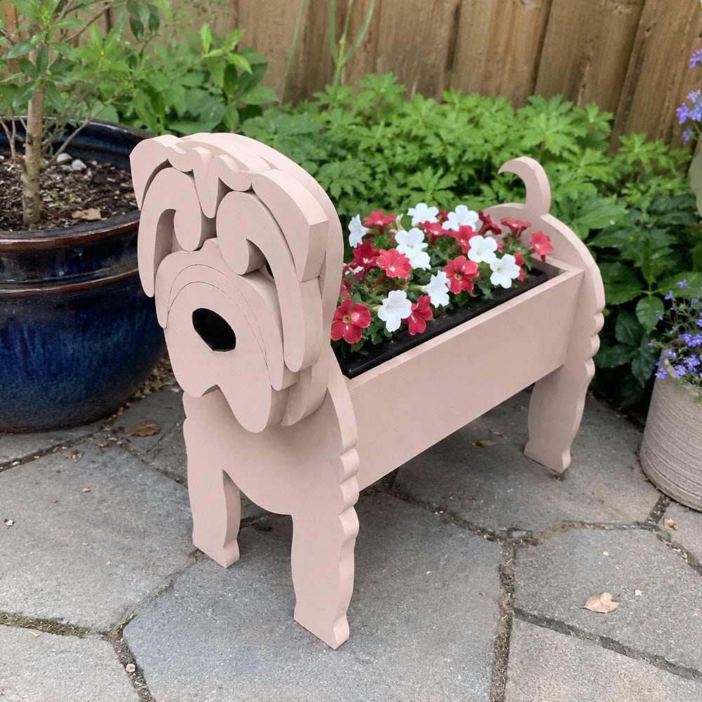 Shar Pei dog planter filled with fresh flowers is placed in the garden