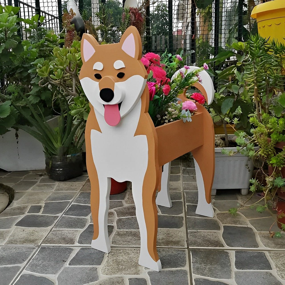 Shiba Inu dog planter filled with fresh flowers is placed in the garden.