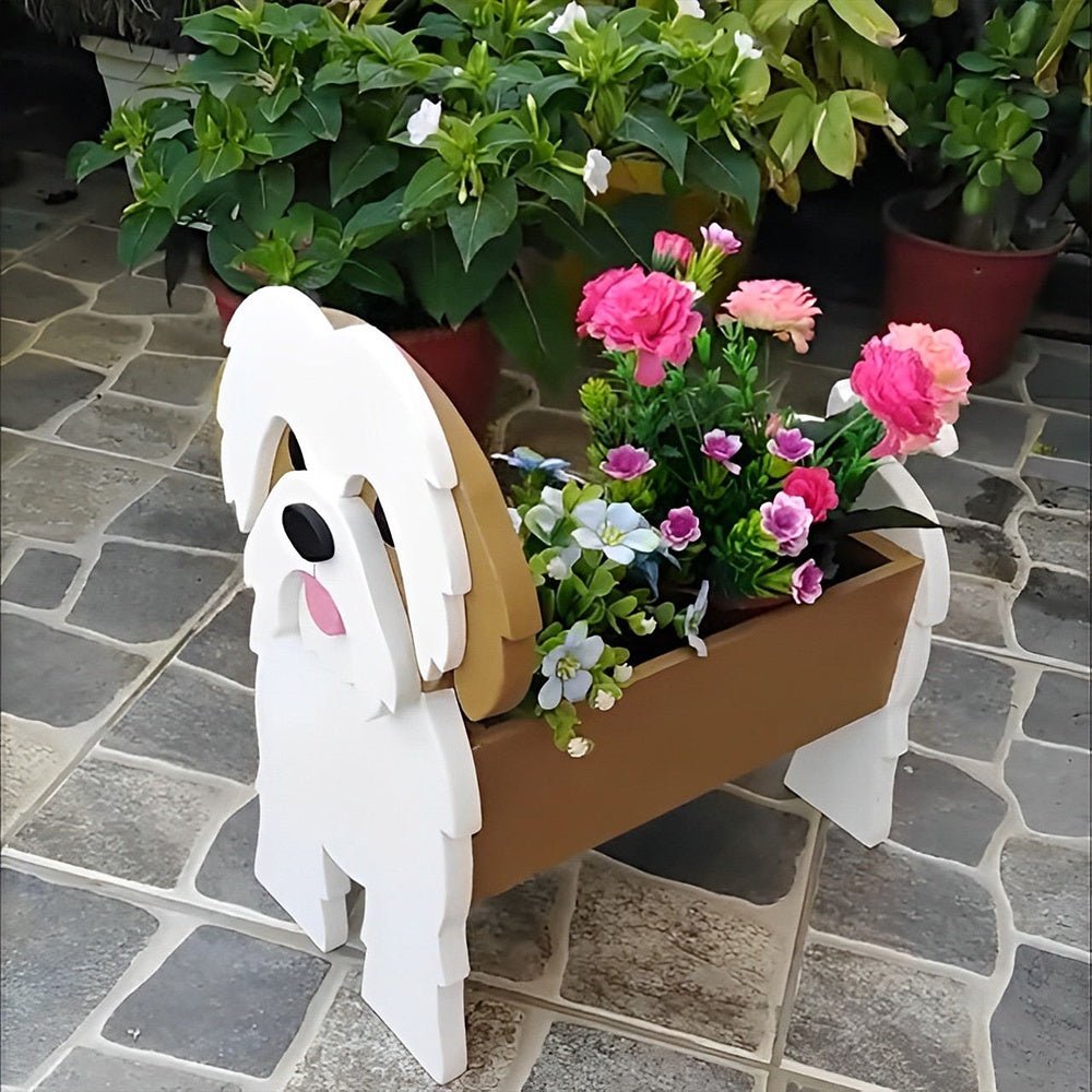 Shih Tzu dog planter filled with fresh flowers is placed in the garden