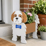 Shih Tzu dog planter filled with fresh flowers is placed in the garden