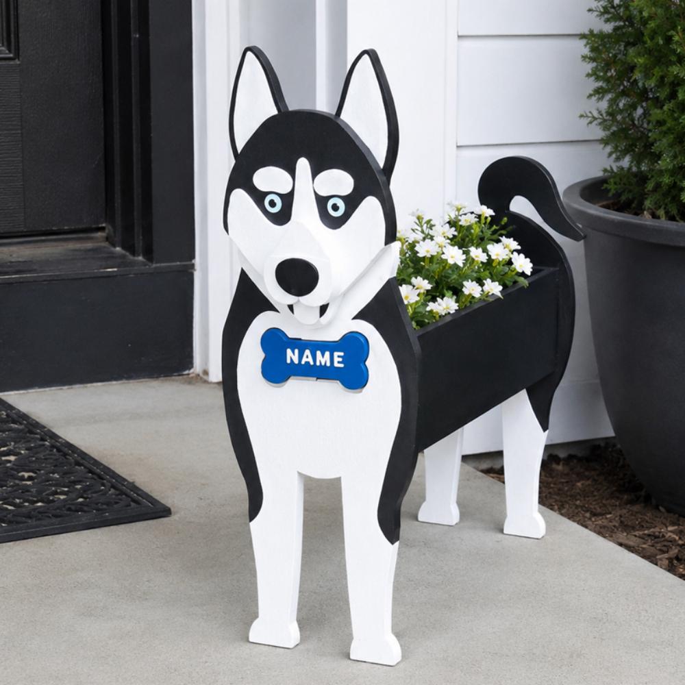 Siberian Husky dog planter filled with fresh flowers is placed in the garden