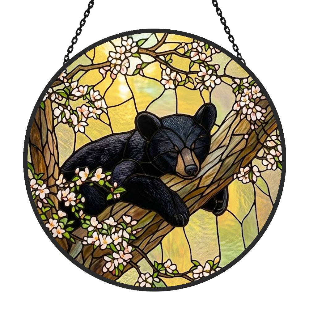sleeping bear on tree stained glass suncatcher window hanging, suitable for home and garden decoration.