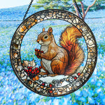 snowy backyard squirrel with holly berries stained glass suncatcher window hanging, suitable for home and garden decoration.