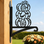Stacked halloween pumpkins metal hanging basket bracket mounted on outdoor wall for plant decoration
