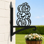 Stacked halloween pumpkins metal hanging basket bracket mounted on outdoor wall for plant decoration