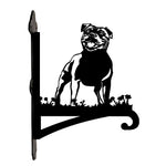 Staffordshire bull terrier metal hanging basket bracket mounted on outdoor wall for plant decoration