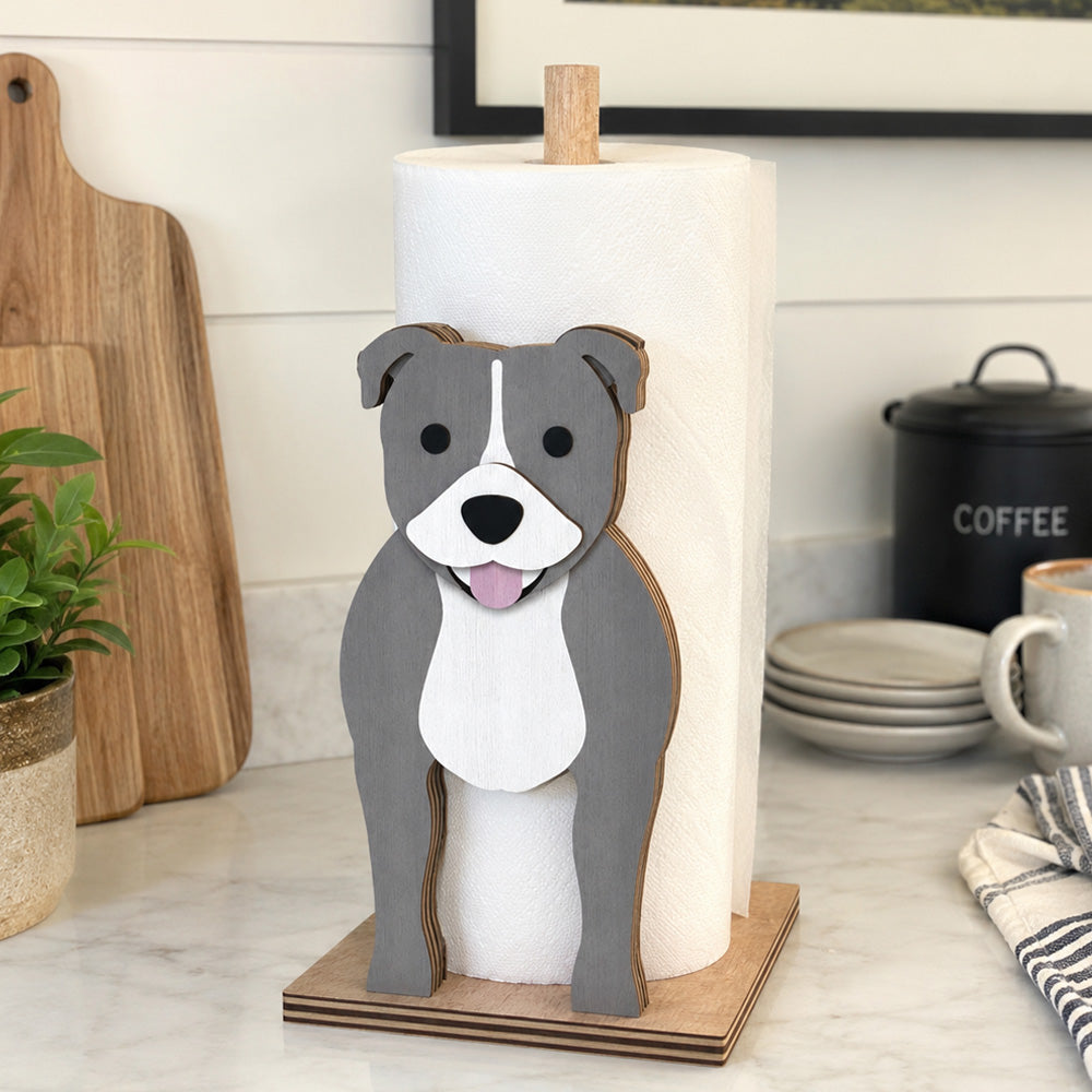 Staffordshire Bull Terrier Wooden Dog Paper Towel Holder displayed on a kitchen countertop with a freestanding paper towel roll