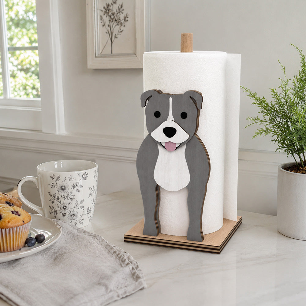 Staffordshire Bull Terrier Wooden Dog Paper Towel Holder displayed on a kitchen countertop with a freestanding paper towel roll