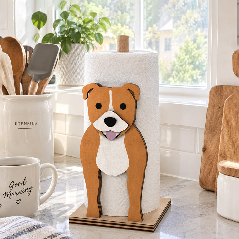 Staffordshire Bull Terrier Wooden Dog Paper Towel Holder displayed on a kitchen countertop with a freestanding paper towel roll