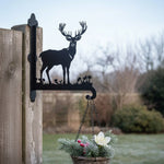 Stag in meadow metal hanging basket bracket mounted on outdoor wall for plant decoration
