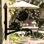 teapot teacup metal hanging basket bracket mounted on outdoor wall for plant decoration.