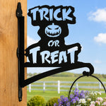 Trick or treat pumpkin metal hanging basket bracket mounted on outdoor wall for plant decoration