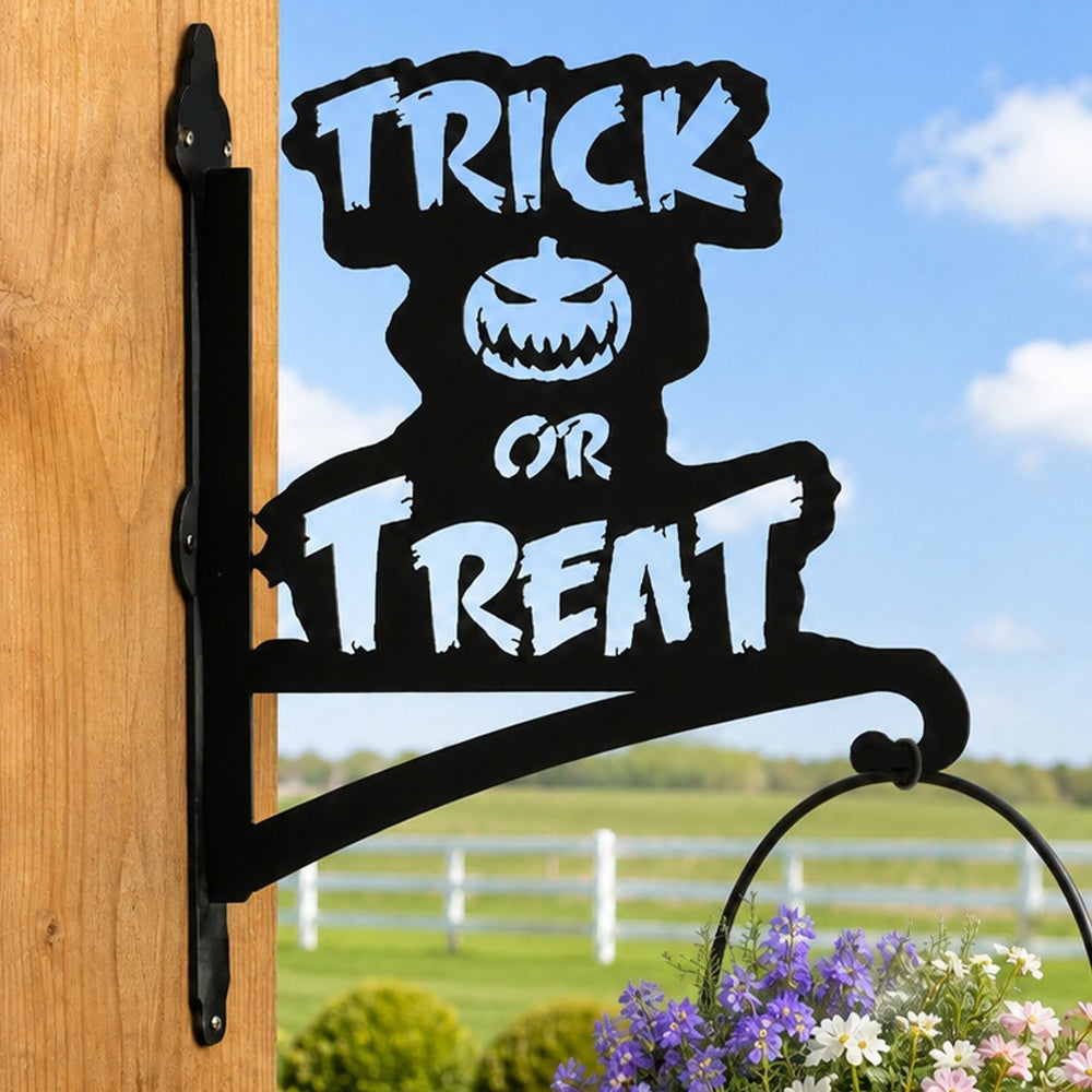 Trick or treat pumpkin metal hanging basket bracket mounted on outdoor wall for plant decoration