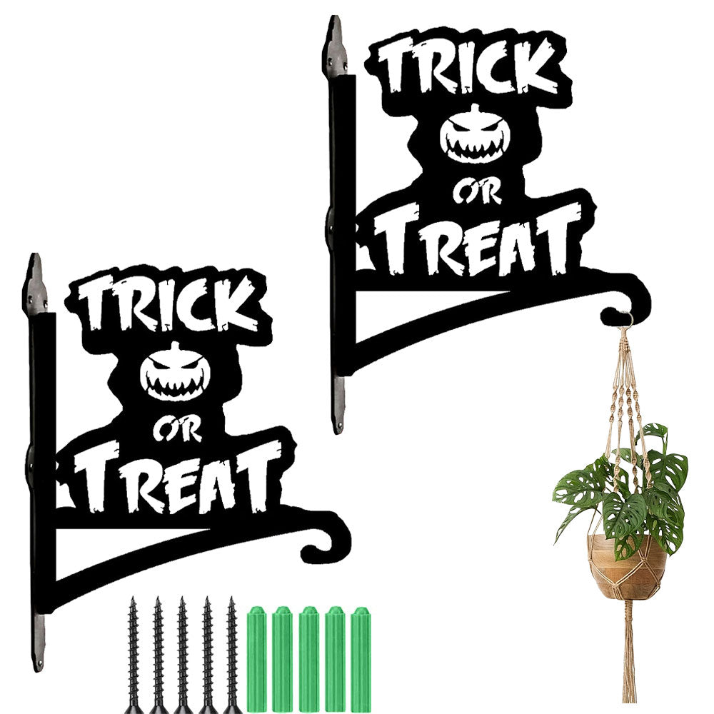 Trick or treat pumpkin metal hanging basket bracket mounted on outdoor wall for plant decoration