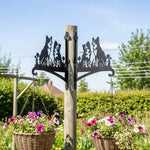 Two border collies metal hanging basket bracket mounted on outdoor wall for plant decoration