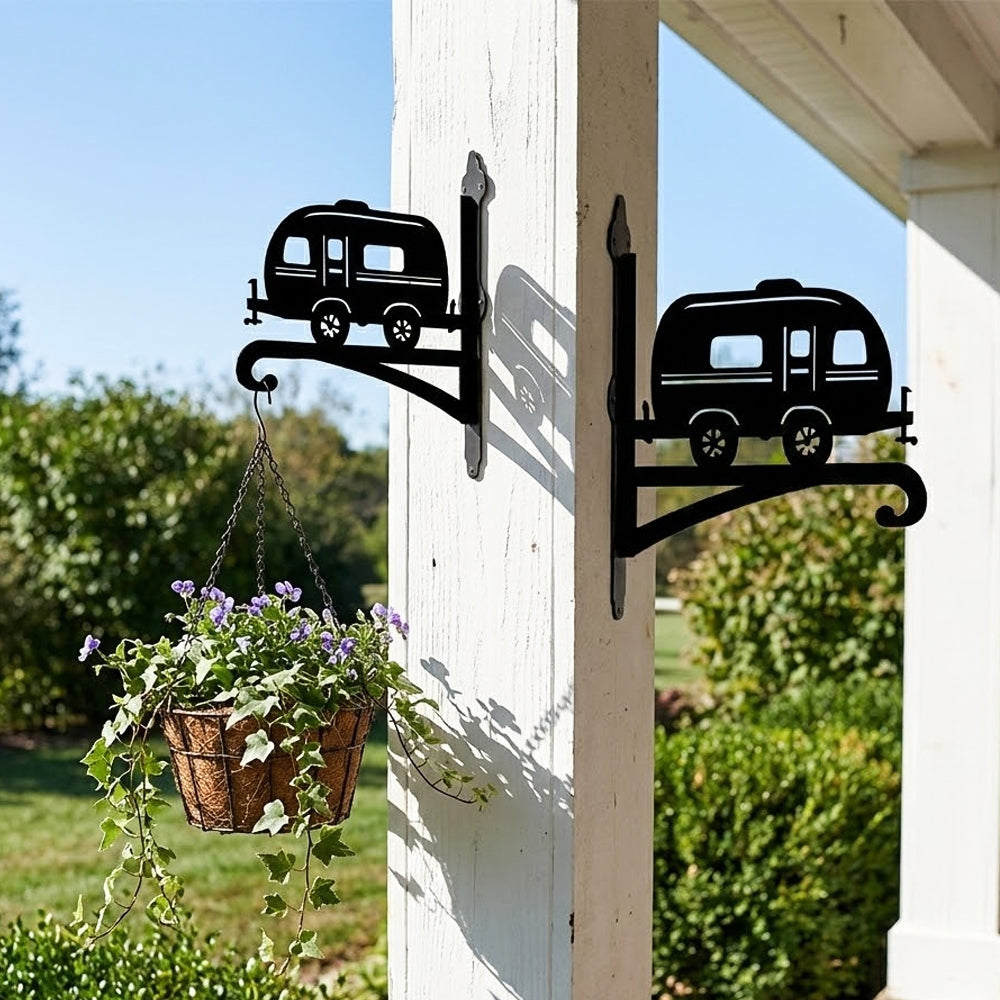 Vintage camper metal hanging basket bracket mounted on outdoor wall for plant decoration