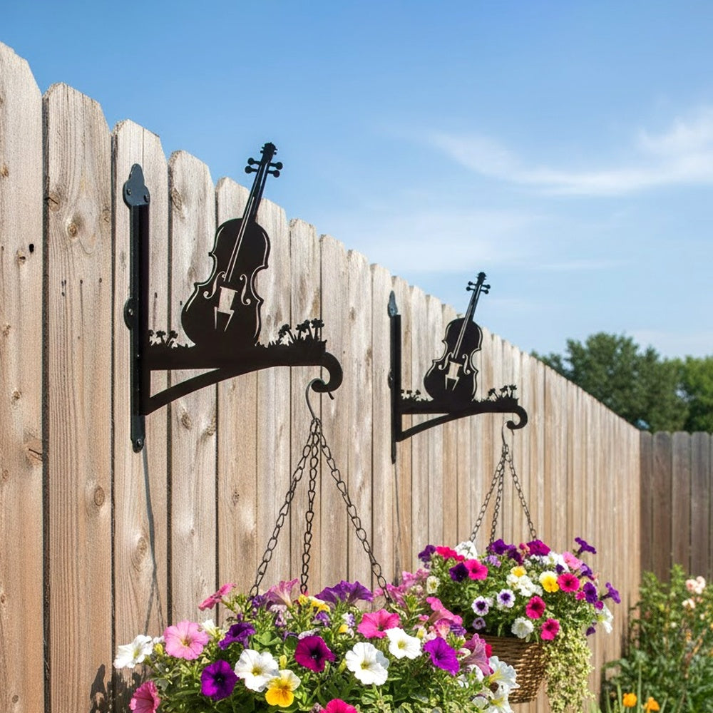 Vintage violin metal hanging basket bracket mounted on outdoor wall for plant decoration