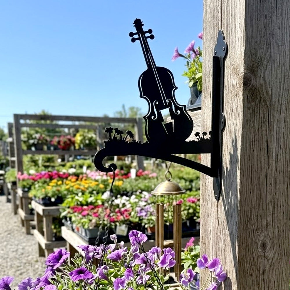 Vintage violin metal hanging basket bracket mounted on outdoor wall for plant decoration