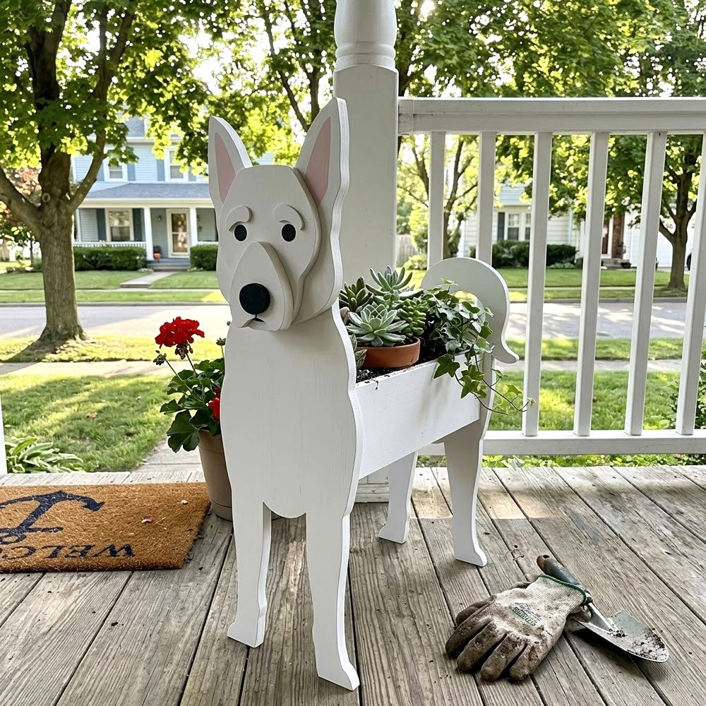 White Swiss Shepherd Dog planter filled with fresh flowers is placed in the garden