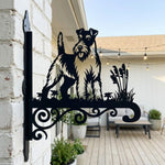Wire fox terrier metal hanging basket bracket mounted on outdoor wall for plant decoration