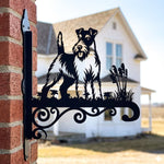 Wire fox terrier metal hanging basket bracket mounted on outdoor wall for plant decoration