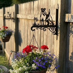 Wire fox terrier metal hanging basket bracket mounted on outdoor wall for plant decoration