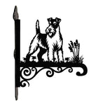 Wire fox terrier metal hanging basket bracket mounted on outdoor wall for plant decoration