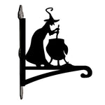 Witch and cauldron metal hanging basket bracket mounted on outdoor wall for plant decoration