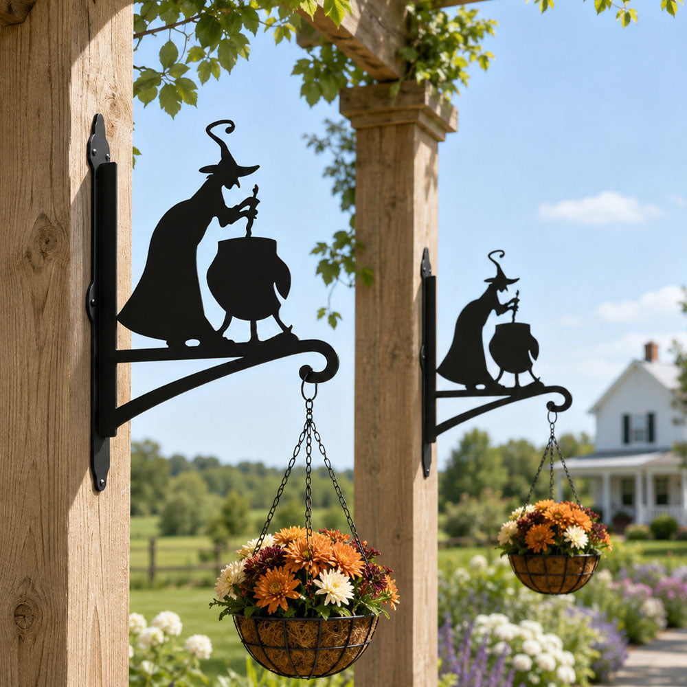 Witch and cauldron metal hanging basket bracket mounted on outdoor wall for plant decoration