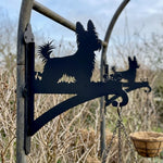 Yorkshire terrier metal hanging basket bracket mounted on outdoor wall for plant decoration